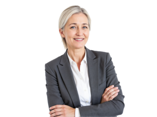 Business professional in a grey suit with arms crossed, smiling warmly in a studio setting during daytime
