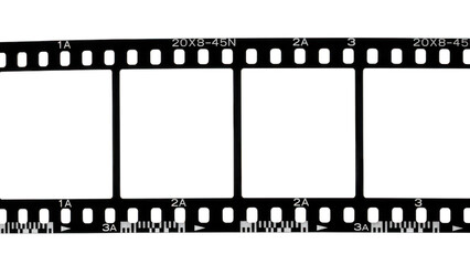 Fototapeta premium Vintage 35mm film strip with frame numbers and sprocket holes isolated on transparent background