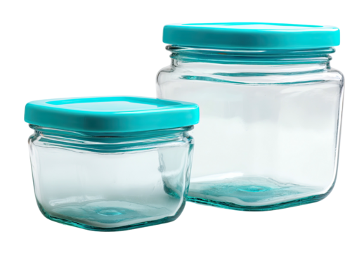 Two clear glass square jars with teal lids on black background