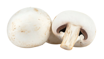 Close-up of three white fungi, one sliced open, on a dark backdrop