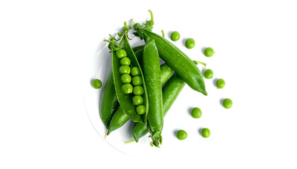 Close-up of open and closed green pea pods with scattered peas on a white plate