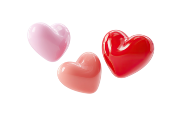 Three glossy heart shapes in red and pink shades float on black