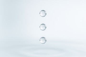 Three water droplets suspended in air, creating a serene and minimalist composition. Concept of purity, fluidity, and the essence of nature in modern design aesthetics.