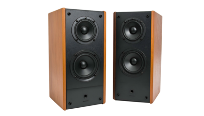 Pair of wooden audio speaker systems, black speaker faces, symmetrical arrangement on black