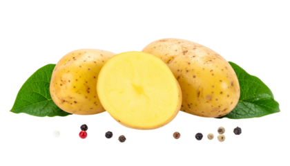 Close-up of three potatoes with one sliced open, surrounded by pepper and leaves