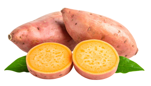 Close-up of whole and halved orange-fleshed sweet potatoes with green leaves on black background