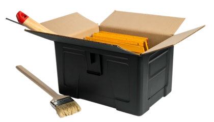 Black tool box open revealing paint brush, folding rule, and a paint scraper