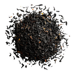 Pile of dark, withered tea leaves on stark black backdrop