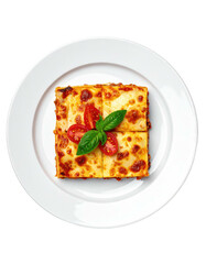 Lasagna slice topped with tomatoes & basil, on a white plate