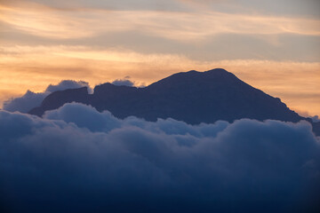 Mountain Peak Emerging from a Sea of Clouds