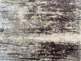 Natural wood texture of a gray board with dark spots