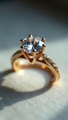 Gleaming solitaire diamond, elegant gold band , gemstone, diamond, gold