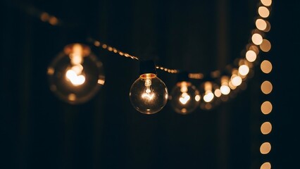 String of lights illuminating a dark space, creating ambiance.