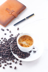 Cup of Coffee with Coffee Beans
