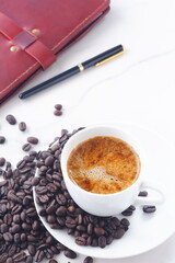 Cup of Coffee with Coffee Beans
