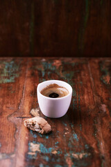Cup of coffee on rustic wooden background. Soft focus. Copy space	