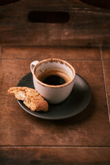 Cup of coffee on rustic wooden background. Soft focus. Copy space	