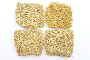 Four dried instant noodles white background