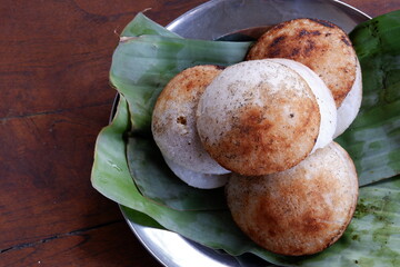 Surabi is a traditional snack typical of Bandung, made from a mixture of rice flour and coconut milk, which is cooked on a small stove using a clay mold