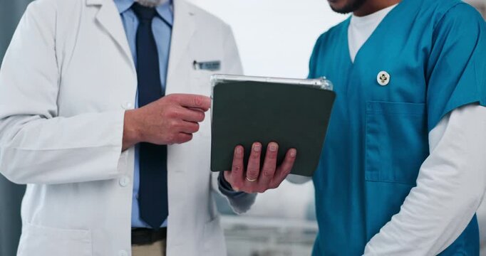 Hands, nurse and doctor with tablet in hospital for EHR system, test results review and advice. People, healthcare team and tech with discussion in clinic for medical research and discharge summary