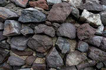 Rock wall background. Stone wall texture. Detail of a traditional dry stone wall