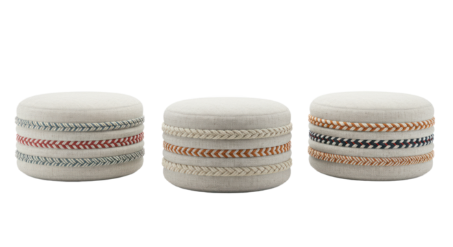 Set of three round upholstered fabric poufs or ottomans with colorful braided rope details, isolated on a black background - Powered by Adobe