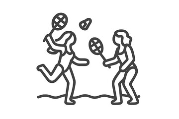 Energetic female friends enjoying a game of badminton on the beach during summer vacation