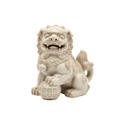Fototapeta premium Ancient stone guardian lion statue holding a ball on a solid black background