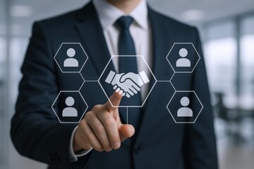 Business man pointing at virtual handshake icon, representing partnership, agreement and global network connection