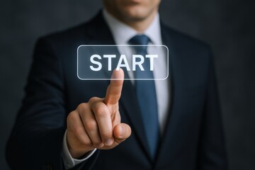 Businessman pressing start button on virtual interface, initiating project, beginning new career or business venture