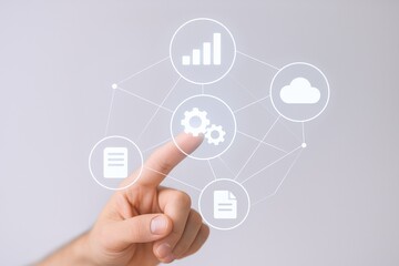 Business Process Automation Concept: Finger Touching Gears Icon on Digital Display for Workflow Optimization