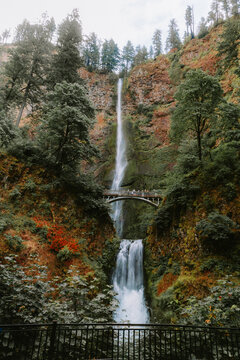 Gloomy day at popular Multnomah Falls during summer crowds