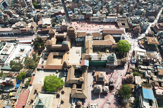 Kathmandu Durbar Square in Basantapur, Nepal, showcases historic palaces, temples, and courtyards. The vibrant square reflects rich architecture, culture, and centuries of Newar heritage.