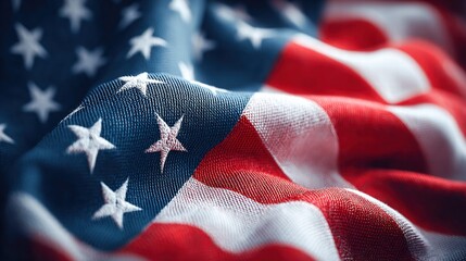Close-up of the American flag waving in the wind, with stars and stripes.