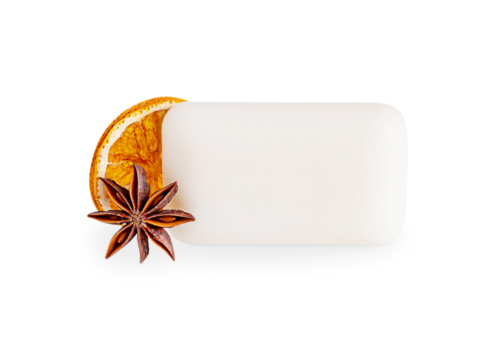 Aromatic organic craft soap bar with dried orange fruit slice and star anise spice isolated on white background used for spa relaxation beauty treatment as handmade hygiene cleansing natural product