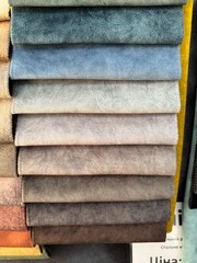 Fabric swatches in different colors, upholstery material for furniture. Samples of fabrics