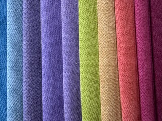 Fabric swatches in different colors, upholstery material for furniture. Samples of fabrics