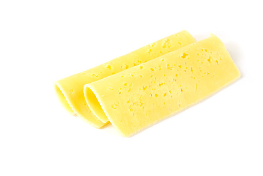  slices of folded Swiss cheese isolated on white