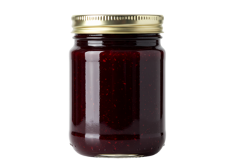 Delicious berry jam in glass jar with golden lid