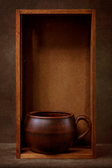 Still life with a cup of tea in a wooden box
