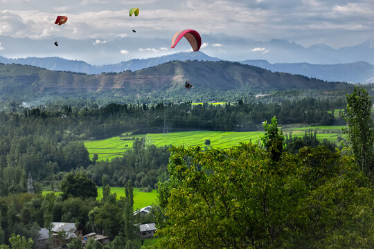 paragliders fly over the Kashmir valley India 2 May 2025