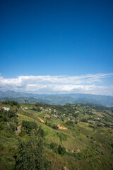 Obraz premium Mountain Valley and Terraced Fields View on the Ha Giang Loop, Vietnam