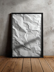 Modern Framed Art Piece Featuring Crumpled White Paper Leaning on Wall