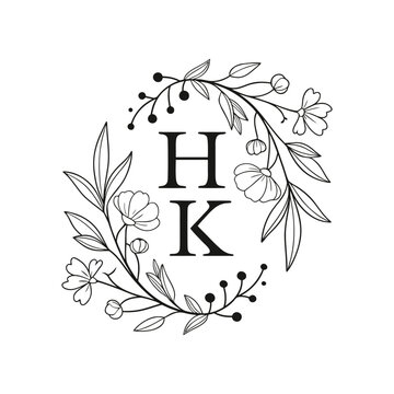 Elegant black and white floral monogram featuring the letters h and k