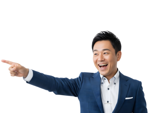 Excited Asian businessman in suit pointing towards opportunity and laughing, showing great enthusiasm and cheerful expression, business promotion, leadership