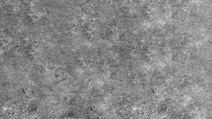 A detailed grayscale texture of weathered concrete surface with natural imperfections and subtle...