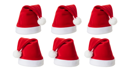 Six small red santa hats with white pom poms on black background