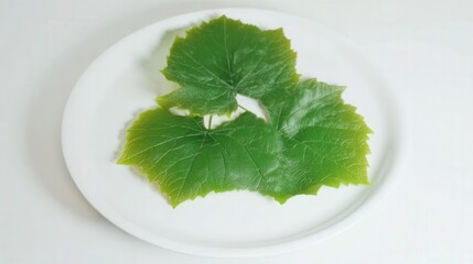 Fresh grape leaves on white plate isolated. Generative AI