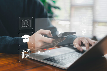 Hands using a smartphone and laptop with floating online learning and video playback icons represent e-learning, digital education, online courses, remote study, modern multimedia learning platforms.