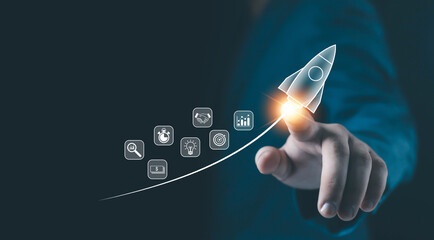 A glowing rocket icon launched from a fingertip represents startup growth, business development, innovation strategy, and digital technology progress for modern companies aiming for success.